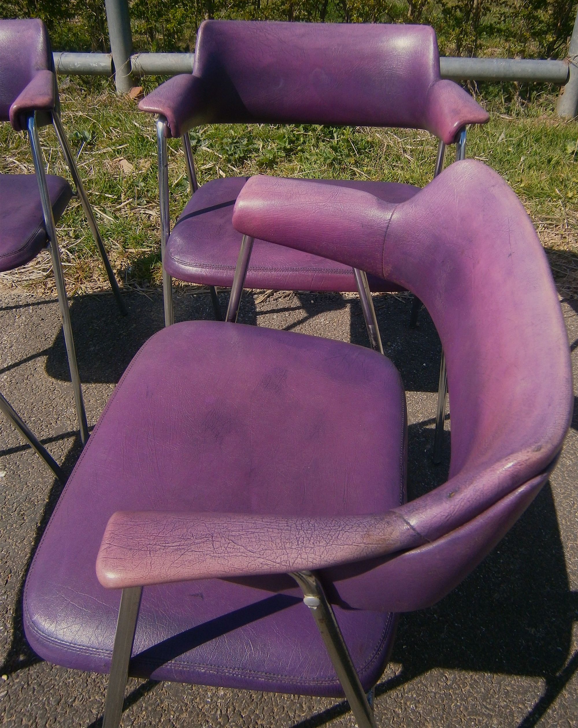 A set of four 1960s chrome framed Pel style elbow chairs